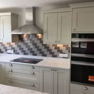 light green kitchen with marble worktop with new electrics fitted in Lakenheath